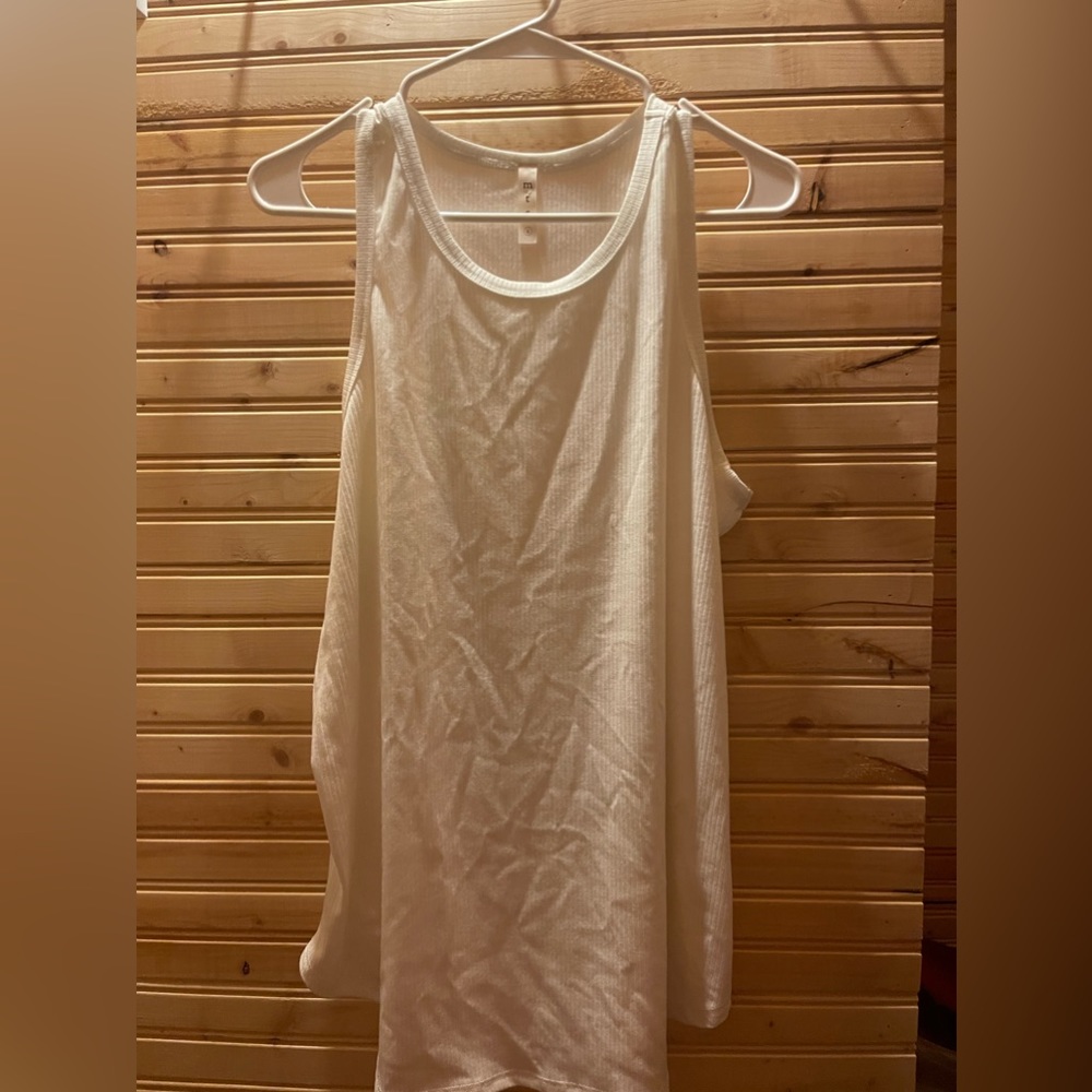 Never worn. White tank top.